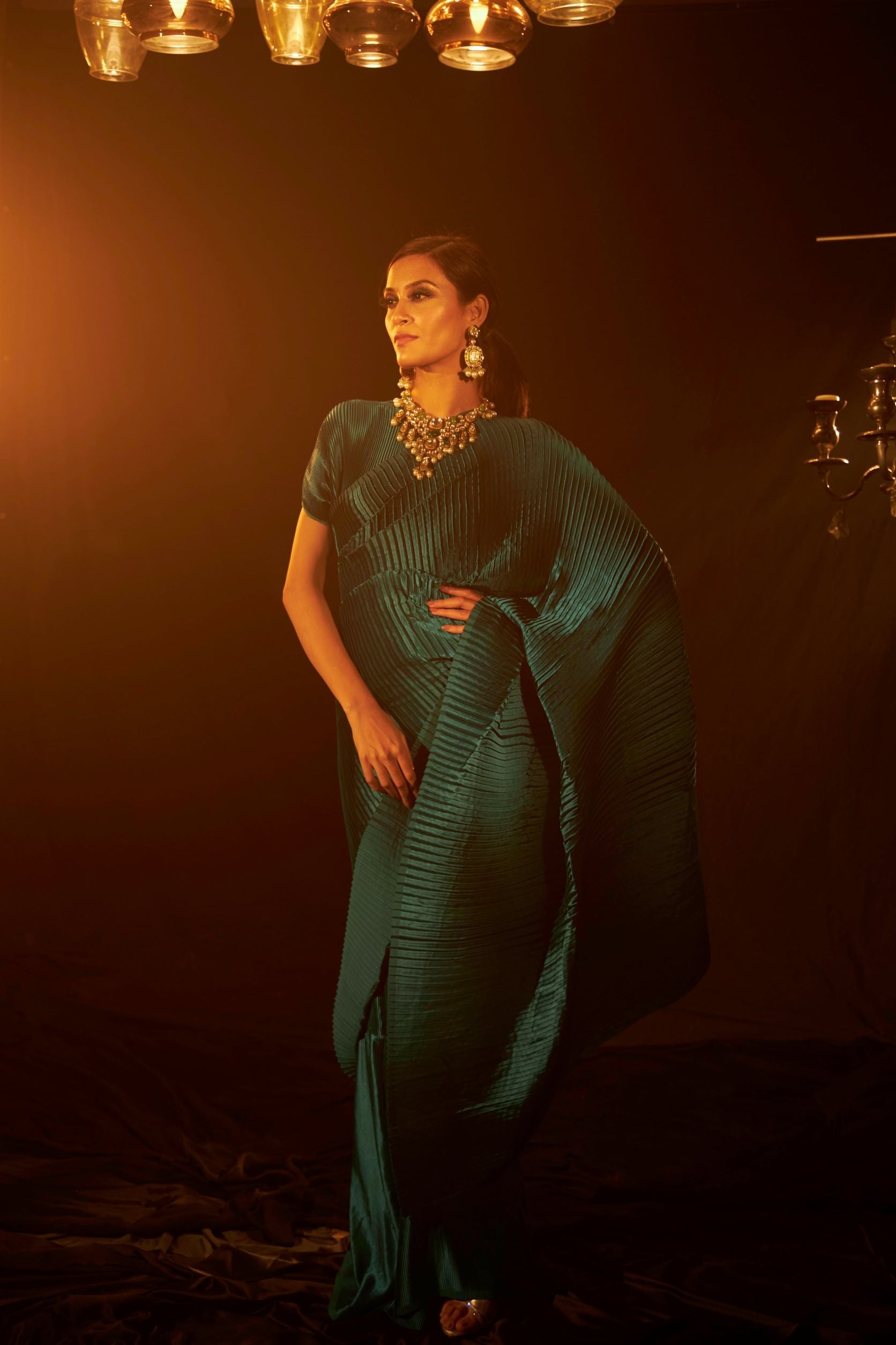 Buy Latest Designer Pleated Gown Saree &amp; Belt in Teal Color at India&#39;s largest Fashion Brand for Women Online. Explore Collection of Sarees at Tasuvure thumbnail