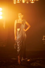 Load image into Gallery viewer, Saia metallic slit saree with an embellished pearl blouse will definitely make you look sassy and elegant in an event.  Tailored to perfection in a metallic fabric, the saree features a slit from the waist level and has an attached palla which creates a great fall.  It comes with a pearl embellished blouse with dori attachments on the back.